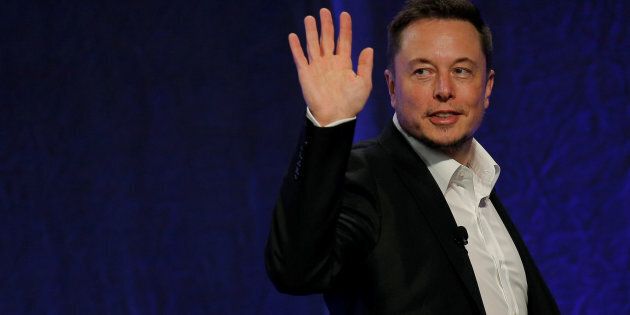 Tesla Motors CEO Elon Musk waves as he leaves the stage after speaking at the National Governors Association Summer Meeting in Providence, R.I., July 15, 2017. The verified Facebook pages of Elon Musk's rocket company SpaceX and electric carmaker Tesla Inc disappeared on Friday, minutes after the Silicon Valley billionaire promised on Twitter to take down the pages when challenged by users.