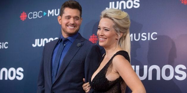 Michael Buble and wife Luisana Lopilato arrive on the red carpet at the Juno Awards in Vancouver, Sunday.