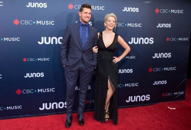 Michael Buble and wife Luisana Lopilato arrive on the red carpet at the Juno Awards in Vancouver, Sunday, March, 25, 2018.