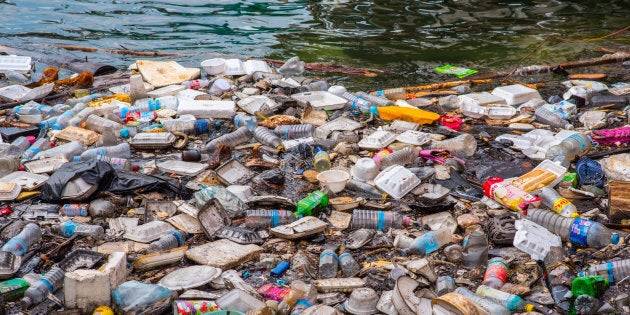 Floating garbage in the sea on the waterfront of Koh Kong, Cambodia.