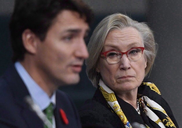 Minister of Crown-Indigenous Relations and Northern Affairs Carolyn Bennett listens as Prime Minister Justin Trudeau speaks at the Canada Modern Treaty and Self-Governing First Nations Forum, in Ottawa on Nov. 1, 2017.