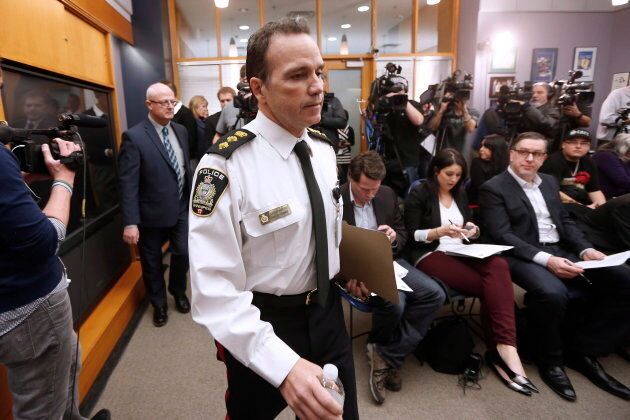 Deputy Chief Danny Smyth and Homicide Sergeant John O'Donovan, left, enter a press conference to announce the arrest of Raymond Joseph Cormier, 53, a suspect in the murder of Tina Fontaine, in Winnipeg, on Dec. 11, 2015. Cormier was arrested in Vancouver.
