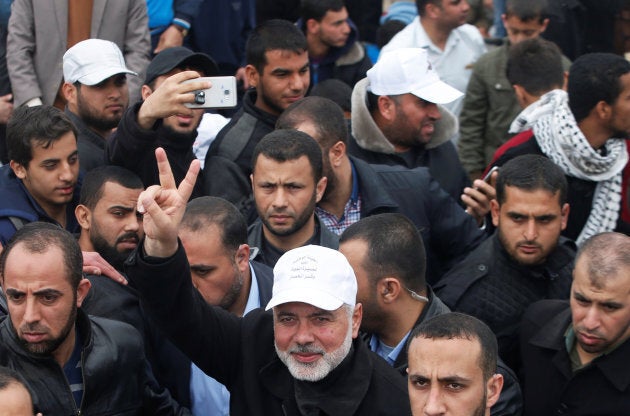 Hamas Chief Ismail Haniyeh gestures during a tent city protest along the Israel border with Gaza, east of Gaza City on March 30, 2018.