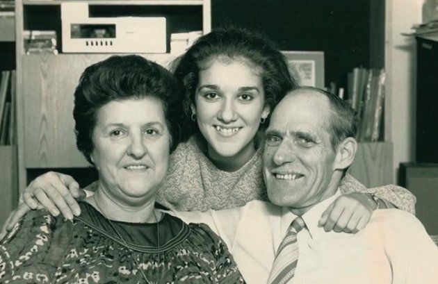 A young Céline poses with her mother, Thérèse and her father, Adhémar Dion in this undated photo.