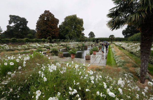 The Duke and Duchess of Cambridge and Prince Harry visit the Sunken Gardens, which has been transformed into the White Garden in memory of Princess Diana.