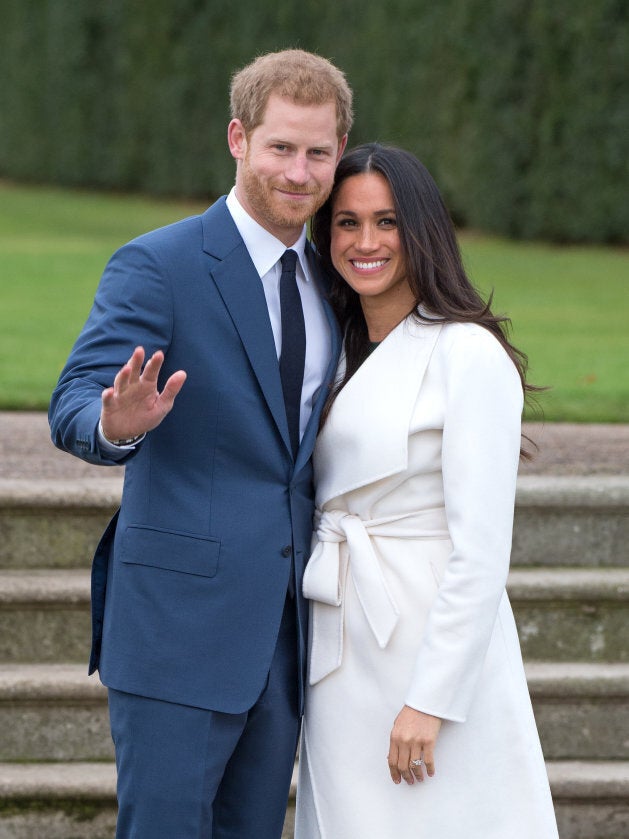 Prince Harry and Meghan Markle attend a photocall in the Sunken Gardens at Kensington Palace following the announcement of their engagement on Nov. 27, 2017.