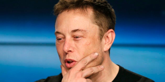 Tesla and SpaceX founder Elon Musk speaks at a press conference following the first launch of a SpaceX Falcon Heavy rocket at the Kennedy Space Center in Cape Canaveral, Fla., Feb. 6, 2018. Tesla shares fell steeply Monday after Musk joked on Twitter that the company was going bankrupt.