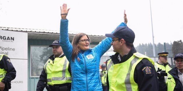 Environmental engineer Romilly Cavanaugh is arrested at a protest against Kinder Morgan's expansion of its Trans Mountain pipeline in Burnaby, B.C. on March 20, 2018.