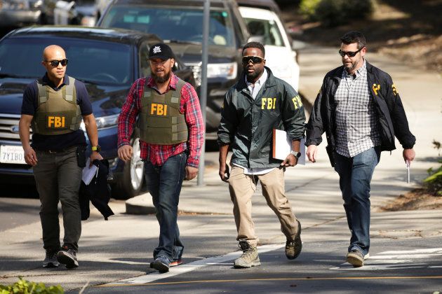 FBI agents are seen near Youtube headquarters following an active shooter situation in San Bruno, California on April 3, 2018.