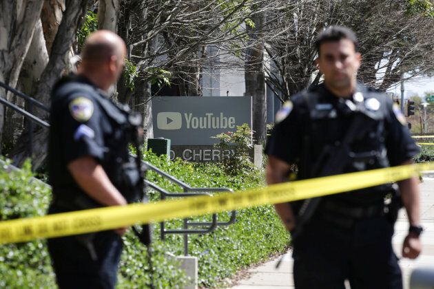 Police officers and crime scene tape are seen at Youtube headquarters following an active shooter situation in San Bruno, California on April 3, 2018.