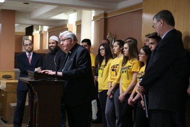 Cardinal Thomas Collins joins interfaith leaders in January for a press conference calling on the government to amend the Canada Summer Jobs guidelines. From left to right, he is joined by Rabbi Chaim Strauchler of the Shaarei Shomayim Congregation, Imam Refaat Mohamed representing the Canadian Council of Imams and Bruce Clemenger, President of the Evangelical Fellowship of Canada.