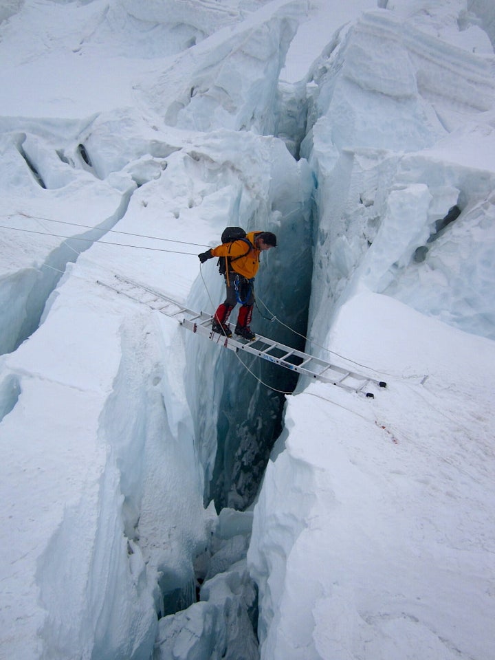 The author on a ladder in the Khumbu Icefall