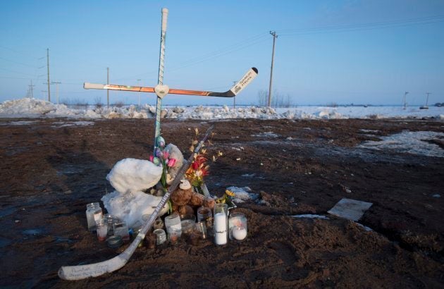 A makeshift memorial at the intersection of the fatal bus crash near Tisdale, Sask. on Tuesday.