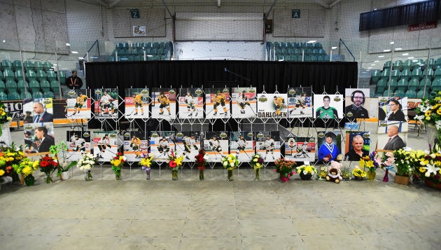 Photos of people involved in a fatal bus crash are seen before a vigil at the Elgar Petersen Arena, home of the Humboldt Broncos, in Humboldt, Sask. on April 8, 2018.