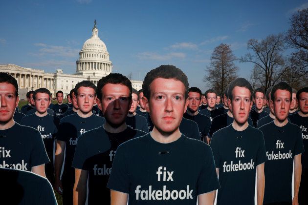 Dozens of cardboard cutouts of Facebook CEO Mark Zuckerberg are seen during an Avaaz.org protest outside the U.S. Capitol in Washington, D.C. on April 10, 2018.