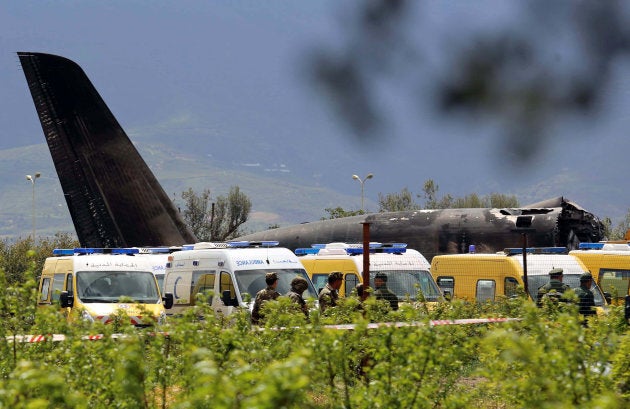 An Algerian military plane is seen after crashing near an airport outside the capital Algiers, Algeria, April 11, 2018