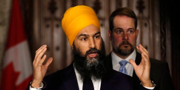 NDP leader Jagmeet Singh speaks to reporters with NDP environment critic Alexandre Boulerice on Parliament Hill in Ottawa on April 11, 2018.