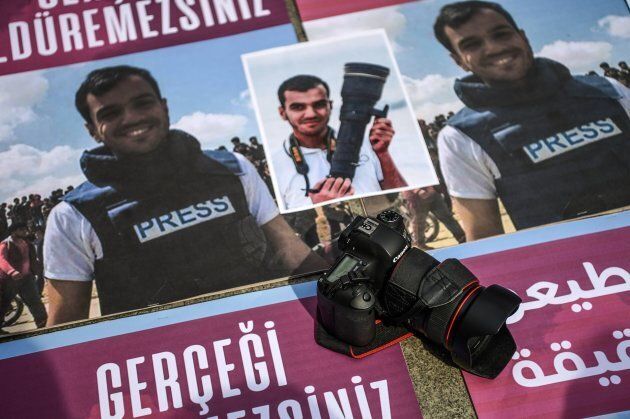 People take part in a protest on April 11 in Istanbul, against the killing of a fellow journalist, Palestinian Yaser Murtaja, who was killed by Israeli forces