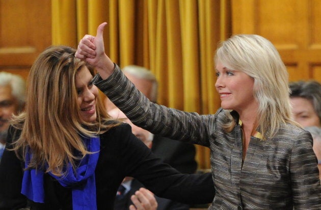 Candice Bergen gives a thumbs up as she votes alongside former Tory MP Eve Adams on Bill C-19, a bill to scrap the long-gun registry, in the House of Commons on Feb. 15, 2012.