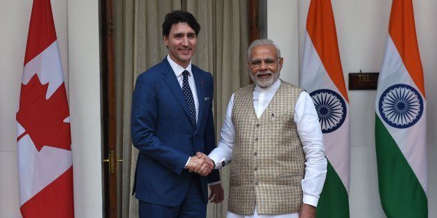 Prime Minister Justin Trudeau and Indian Prime Minister Narendra Modi shake hands before a meeting at Hyderabad house in New Delhi on Feb. 23, 2018.