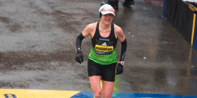 Krista DuChene of Canada crosses the finish line in third place for the 2018 and 122nd Boston Marathon for Elite Women's race with a time of 2:44:20 on April 16, 2018 in Boston, Mass.