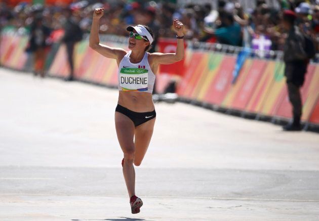Krista Duchene celebrates at the final of the women's marathon at the 2016 Rio Olympics.