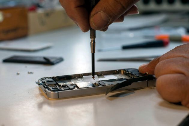 An Apple iPhone undergoing repairs.