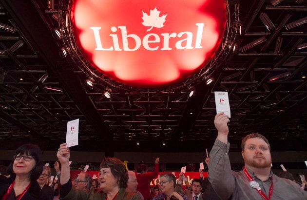 Federal Liberal party delegates vote on a resolution during the party's biennial convention in Montreal on Feb. 23, 2014.