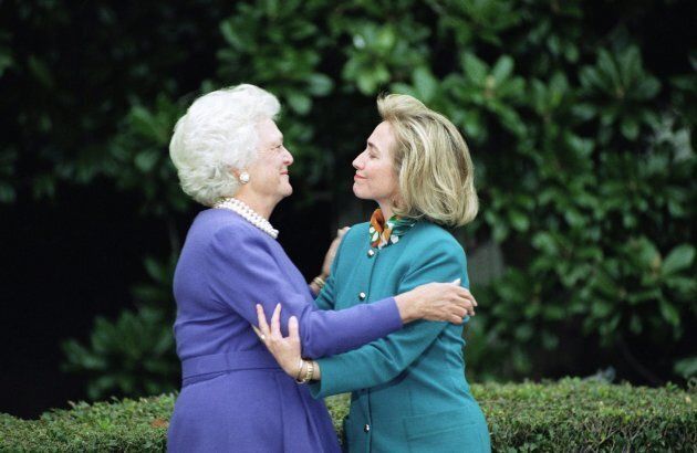 In this 1992 file photo, first lady Barbara Bush greets first lady-to-be Hillary Clinton upon her arrival at the White House in Washington, D.C.