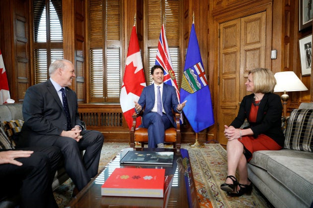 Prime Minister Justin Trudeau meets with British Columbia Premier John Horgan and Alberta Premier Rachel Notley in Trudeau's office, April 15, 2018.