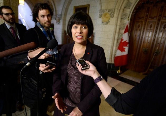 Minister of Health Ginette Petitpas Taylor speaks to reporters following Question Period in the House of Commons on Parliament Hill on April 18, 2018.