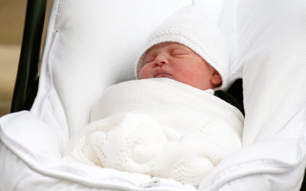 The royal boy sleeping in his car seat.