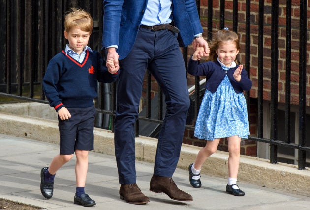 The Duke of Cambridge with Prince George and Princess Charlotte outside the Lindo Wing at St Mary's Hospital.