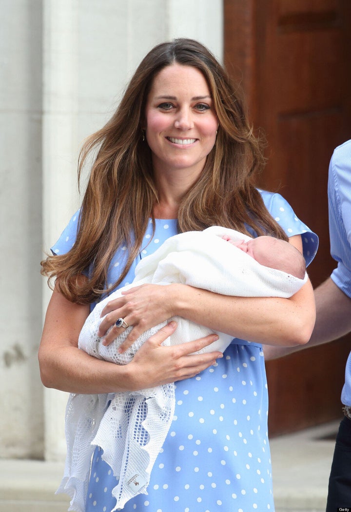 Catherine, Duchess of Cambridge departs The Lindo Wing with Prince George at St Mary's Hospital on July 23, 2013.