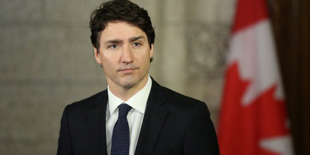 Prime Minister Justin Trudeau listens on Parliament Hill on April 24, 2018.