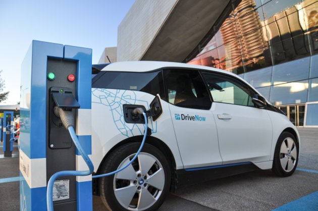 A 'DriveNow' BMW i3 electric car being charged at a charging station at 'BMW Welt' near BMW headquarters on Aug. 7, 2016.