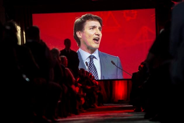 A video screen shows the image of Prime Minister Justin Trudeau as he delivers a speech at the federal Liberal national convention in Halifax on April 21, 2018.