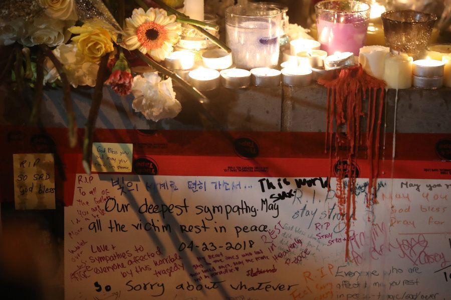 Messages written by Toronto residents honour the victims of a deadly van attack that took place on April 23, 2018.