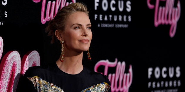 Charlize Theron poses at the premiere for