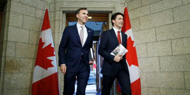 Prime Minister Justin Trudeau, right, and Finance Minister Bill Morneau, left, walk from Trudeau's office to the House of Commons to deliver the budget on Parliament Hill in Ottawa on March 22, 2017.