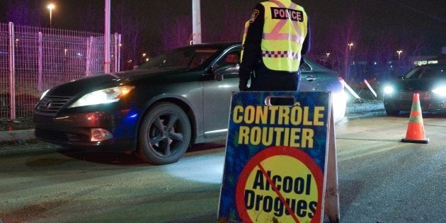 Police units from Montreal's north shore conducting a drug and alcohol checkpoint in Laval, Que. on Nov. 30, 2017.