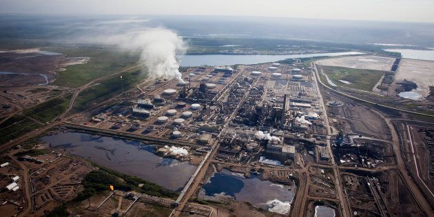 The Syncrude Canada Ltd. oilsands upgrading plant north of Fort McMurray, Alta., Thurs. June 4, 2015. The decision by Europe's largest bank, HSBC, to halt funding for new projects in the oilsands has some wondering if other financial institutions, including U.S. banks and pension funds, will eventually follow suit.