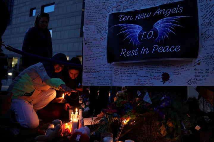 Mourners attend a vigil in memory of victims of a van attack on Yonge Street in Toronto on April 29, 2018.
