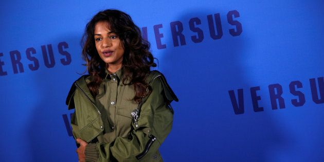 Musician M.I.A. poses for photographers at the Versus catwalk show during London Fashion Week Feb. 18, 2017.