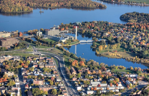 An aerial view of Ottawa's old City Hall, surrounded by residential neighbourhoods.