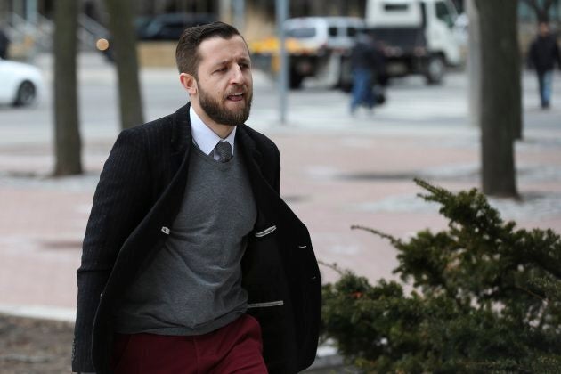 Vice News journalist Ben Makuch heading into court in Toronto in his ongoing trial.