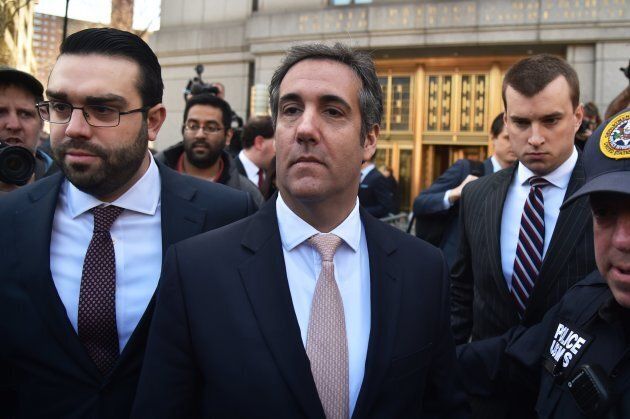 U.S. President Donald Trump's personal lawyer Michael Cohen, centre, leaves the US Courthouse in New York on April 26, 2018.