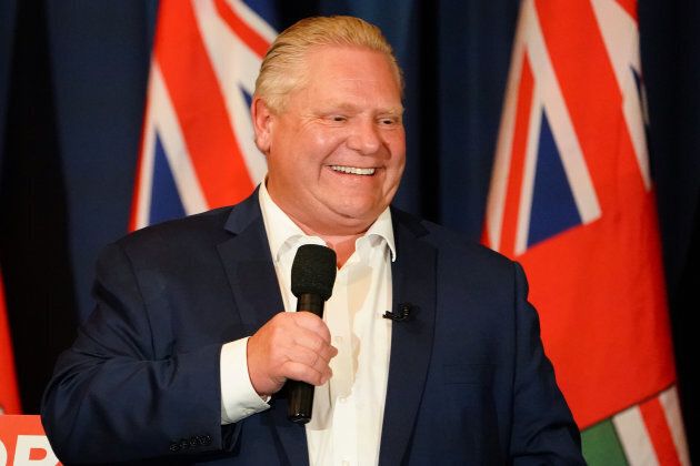 Progressive Conservative party leader Doug Ford reacts at a campaign rally in Oshawa, Ontario on April 30, 2018.