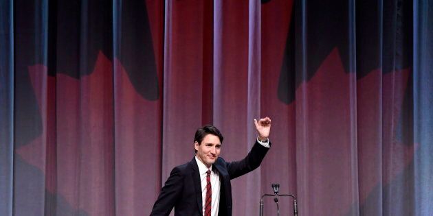 Prime Minister Justin Trudeau waves after speaking at the National Liberal Caucus Holiday Party in Ottawa on Dec. 13, 2017.