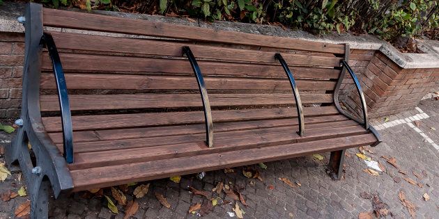 Some benches with bars, like this one seen in Rome, Italy, are brought up in discussions over